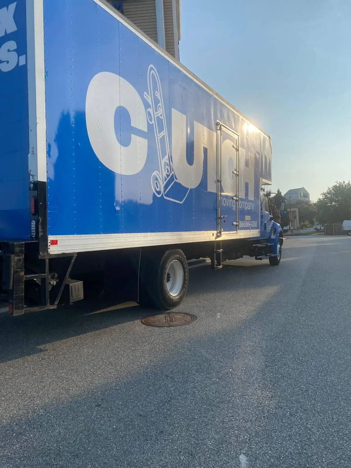 Clutch Moving Company truck parked on a street